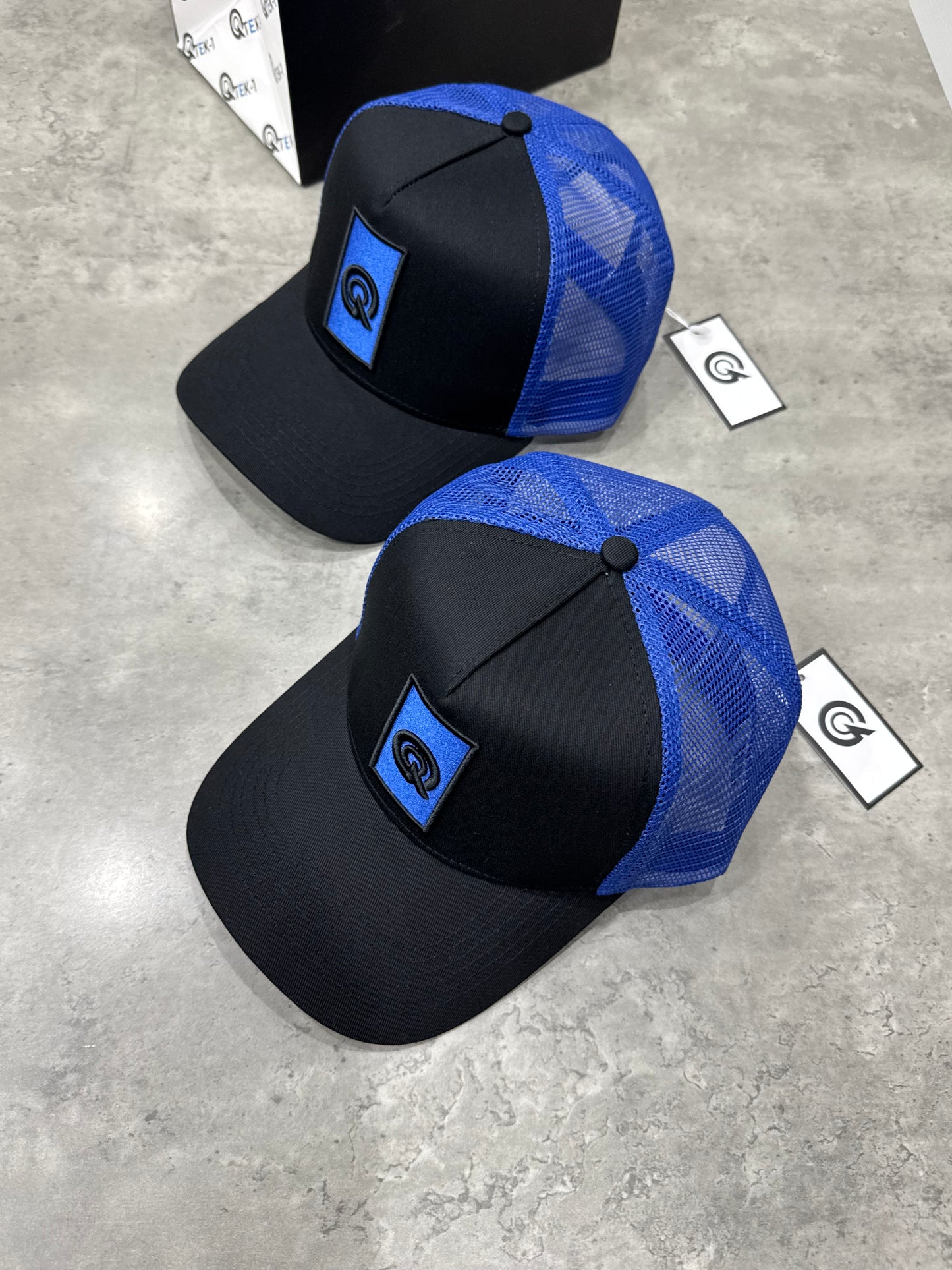 BLACK/ ROYAL BLUE BOX LOGO TRUCKER