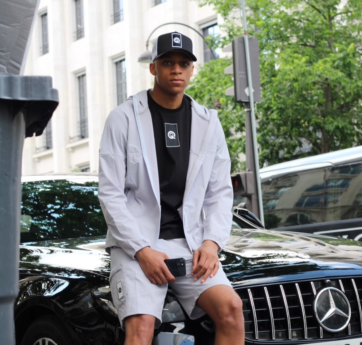 BLACK/WHITE REVERSED LOGO TRUCKER CAP